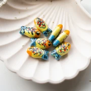 Ceramic fish bead 21x11 mm - Yellow - Orange - Blue x1