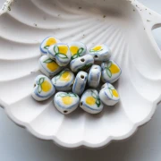 Ceramic heart bead 12x14 mm - Lemon motif - White - Yellow x1