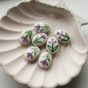 Ceramic oval bead 19x14.5 mm - flower motif - White - Violet - Green x1