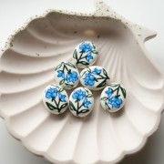 19x16 mm oval ceramic bead - flower motif - White - Blue - Green x1