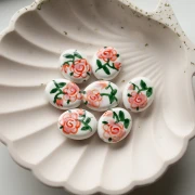 Ceramic oval bead 19x16 mm - flower motif - White - Pink - Green x1