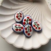 Ceramic oval bead 22x16.5 mm - Tomato pattern - White - Red - Blue x1