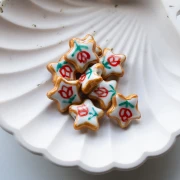 17 mm ceramic star bead - tulip motif - White - Red x1