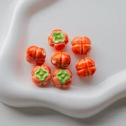 16 mm ceramic tomato bead - Orange - Green x1