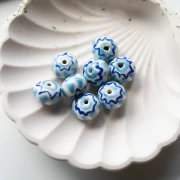 Ceramic roundel bead 15x10.5 mm - Light blue - Dark blue x1