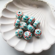 Ceramic roundel bead 15x10.5 mm - Turquoise - Red x1