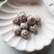 Ceramic roundel bead 15x10.5 mm - Light pink - Green x1