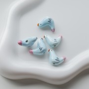 Ceramic bird bead 15x21 mm - Sky blue - Pink x1