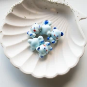 Ceramic 19.5x16 mm teddy bear bead - Multi Blue x1