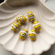 Ceramic clown fish bead 13x17.5 mm - Yellow - White x1