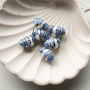 Ceramic clown fish bead 13x17.5 mm - Blue - White x1