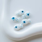 11x19.5 mm Ceramic Fish Beads - White with Sky Blue Dots x1