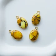 18x11 mm oval gemstone charm - Yellow Oyster Turquoise x1