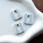 Acetate 21 mm hollow square pendant - White - Light blue stripes x1