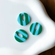 Round hollow acetate pendant 21 mm - Light blue - Dark green stripes x1