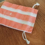 Gift - Striped cotton pouch with Perles and Co logo