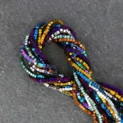 Mini-beads imitation hematite cubes 1.4mm Dark Purple Metallic x40cm