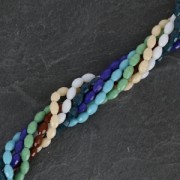 Glass beads grains of rice faceted 6x4 mm - Nude x41cm