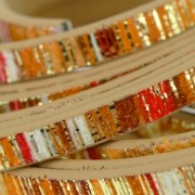 Fancy ribbon imitation leather 5 mm orange stripes golden glimmers x1.2m
