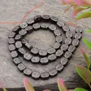 8.5x7x4mm Synthetic Hematite bead Head of Buddha - Jet Hematite x1