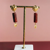 boucles d'oreilles créoles en acier inox avec pendentif fleur