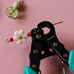 former une boucle avec la pince looper