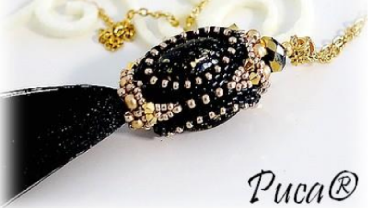 Schema  Bag accessory, angel pearl pompom with Athos pearls by Puca