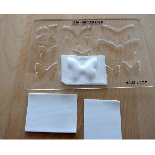 DIY 3D effect butterfly farandole created with a template for polymer clay : Step 1