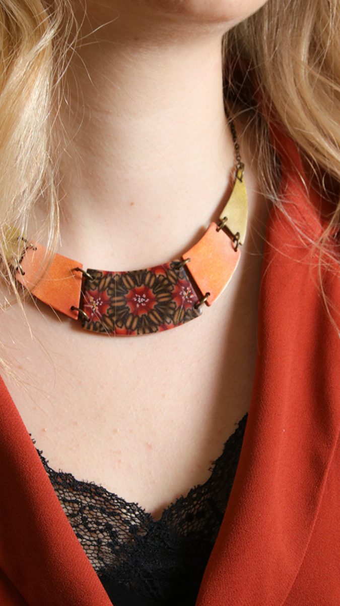 Schema Geometrical breastplate collar and kaleidoscope duck made of polymer clay Schema Geometrical breastplate collar and kaleidoscope duck made of polymer clay