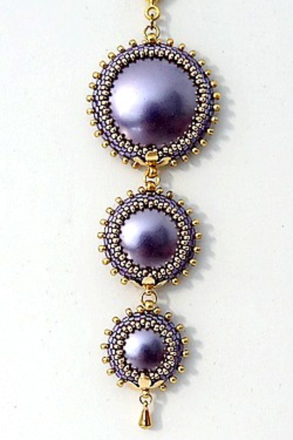 Schema  Takamata pendant with cabochons by Puca set with Miyuki beads