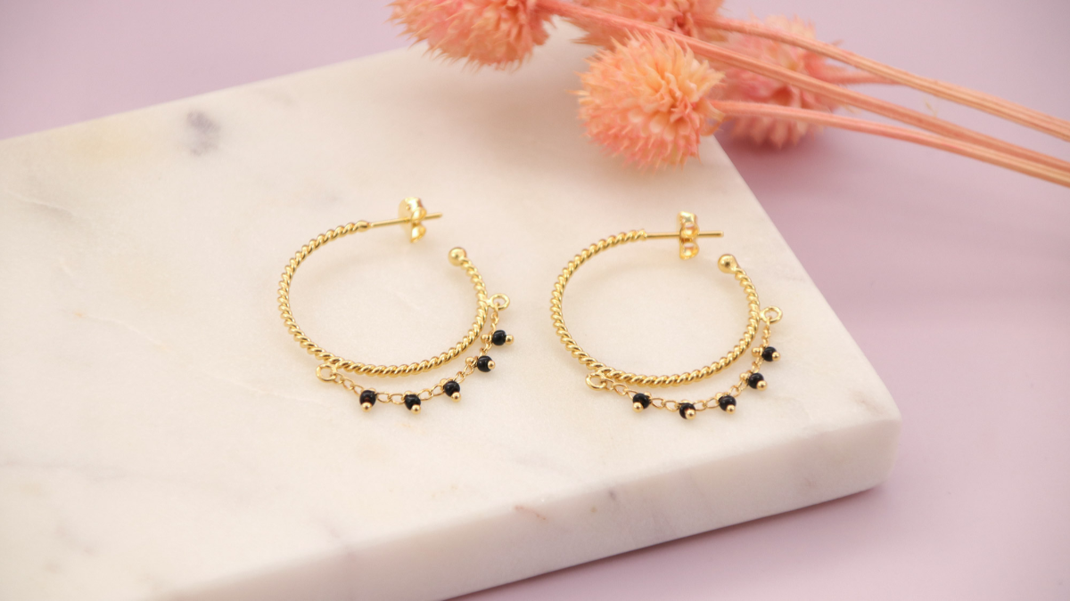 Gold-plated hoop earrings with black seed beads chain Gold-plated hoop earrings with black seed beads chain