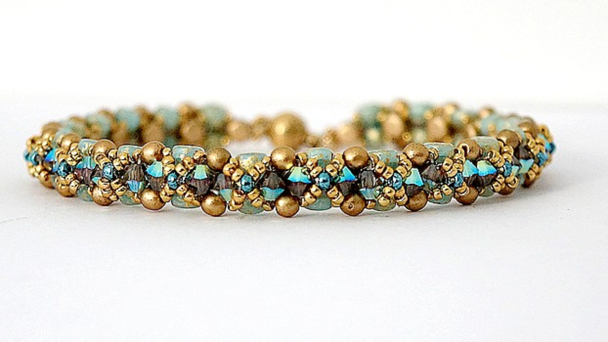 Schema Prince's bracelet with Kalos beads by Puca and PureCrystal spinning tops Schema Prince's bracelet with Kalos beads by Puca and PureCrystal spinning tops