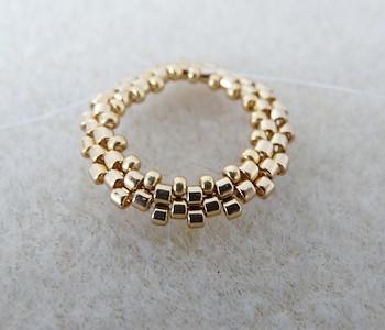 Earrings in Arcos® beads and PureCrystal beads by Puca® : Step 3