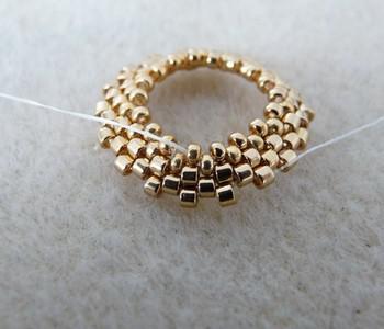 Earrings in Arcos® beads and PureCrystal beads by Puca® : Step 4