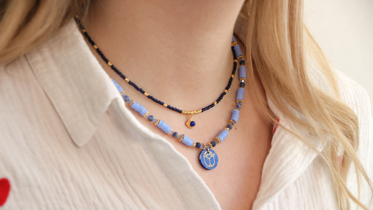 Duo of gemstone gri-gri necklaces with scarab pendant