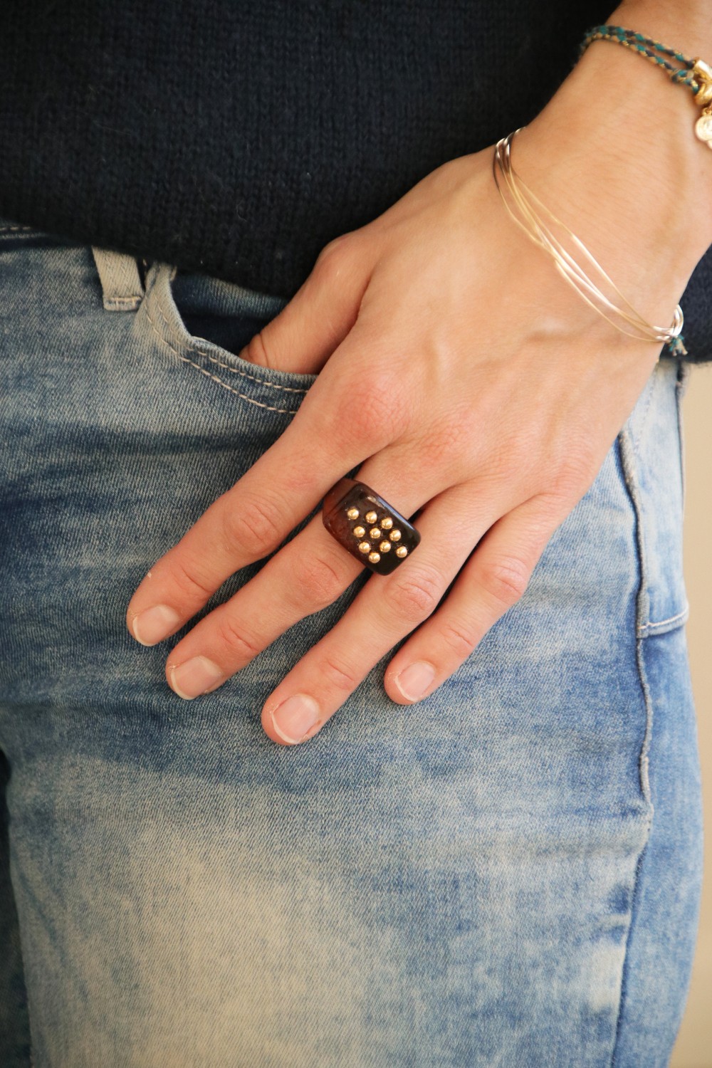 Large colored resin ring with golden balls