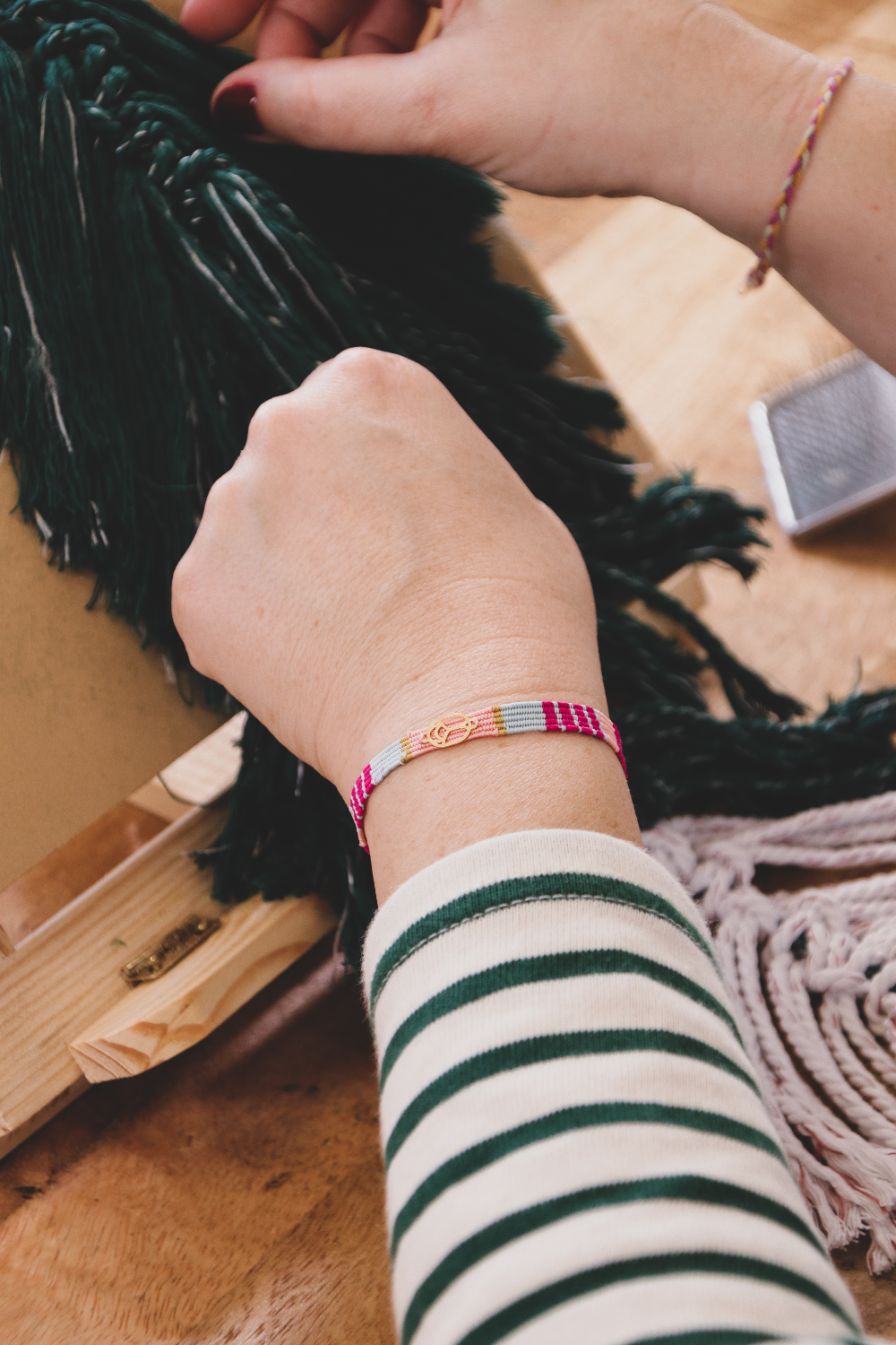 Woven silk thread bracelet with golden scarab insert