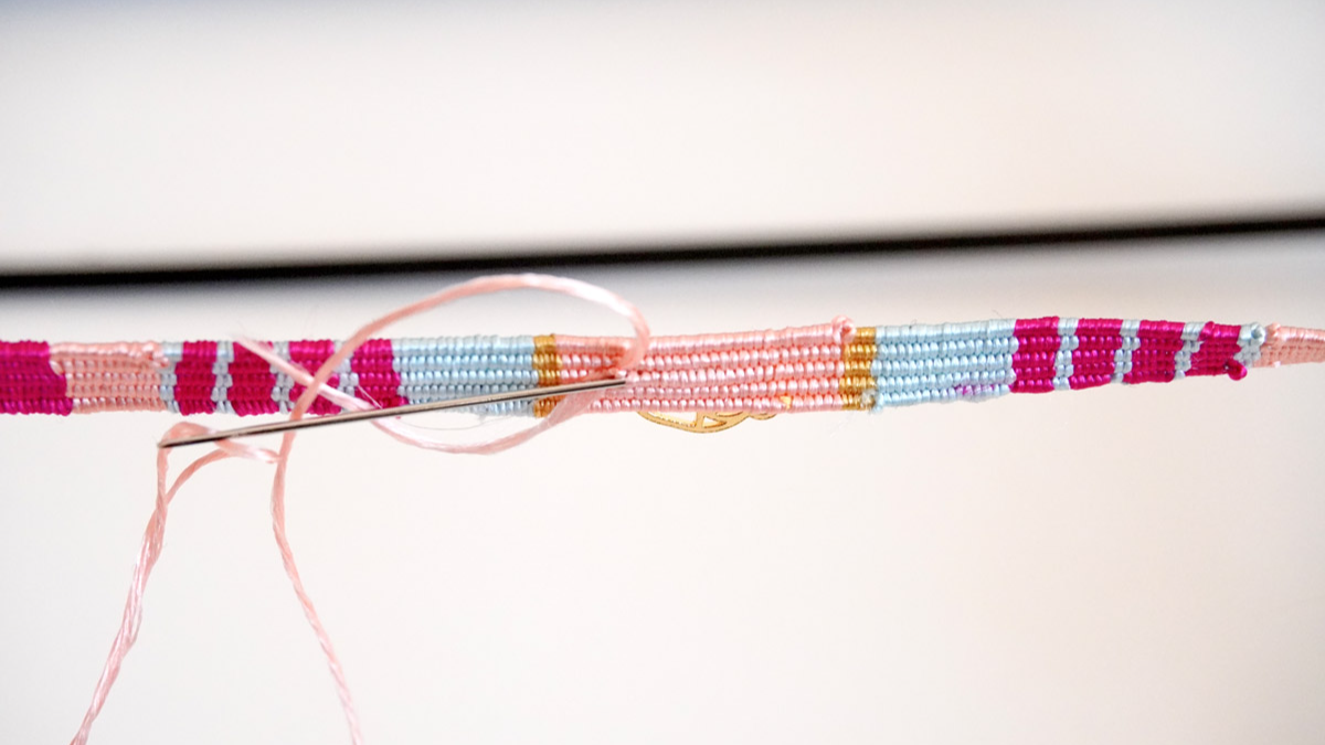 Woven silk thread bracelet with golden scarab insert : Step 9