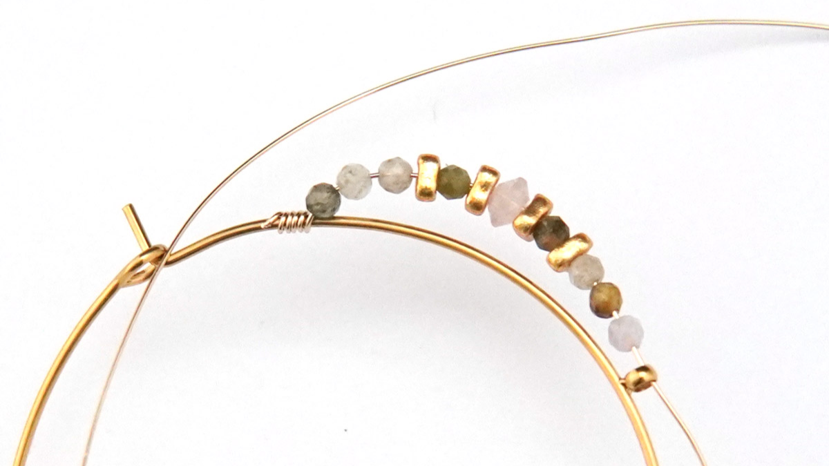 Gold plated stainless steel hoop earrings with Tourmaline beads : Step 2