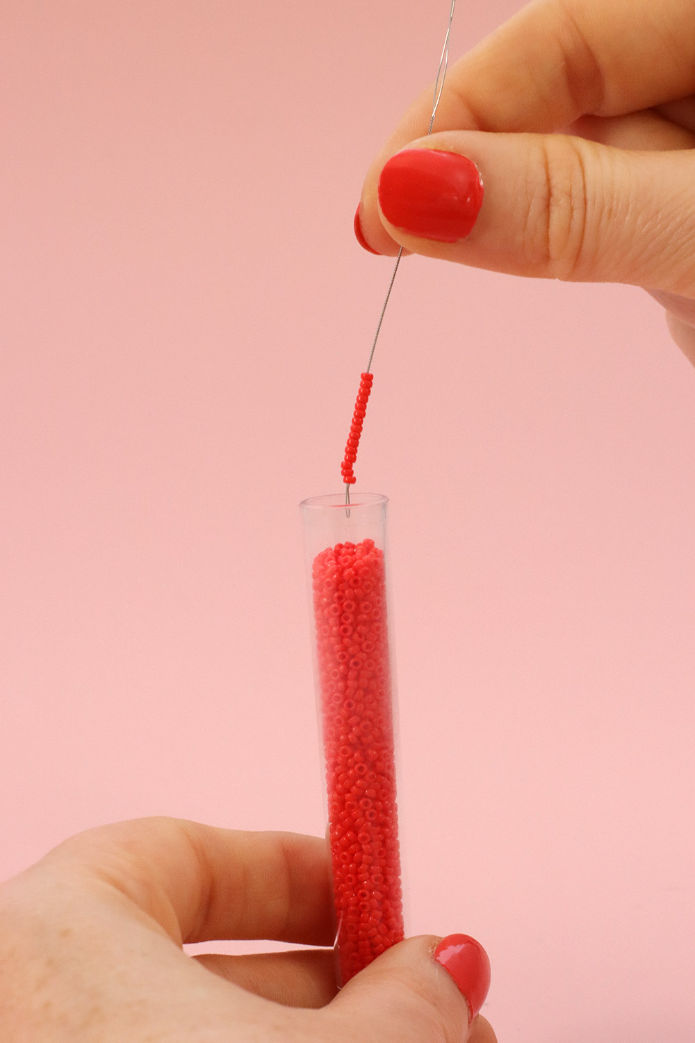 Schema Multi thread bracelet with red seed beads Schema Multi thread bracelet with red seed beads