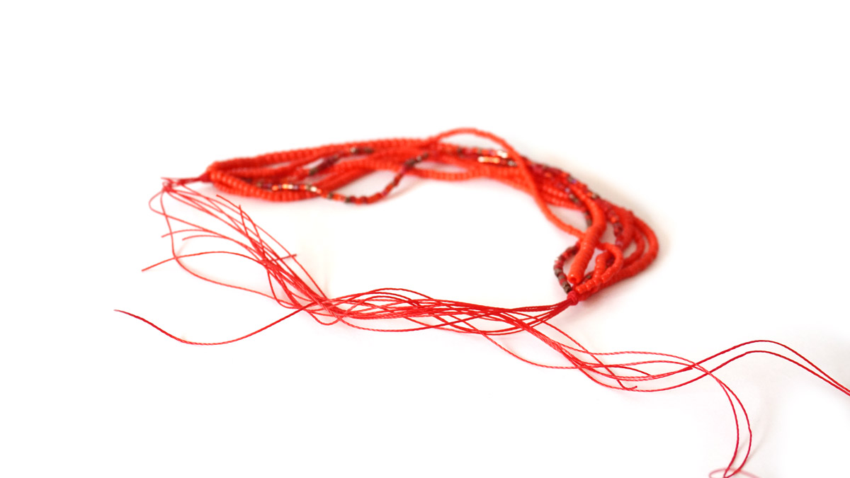 Multi thread bracelet with red seed beads : Step 3 Multi thread bracelet with red seed beads : Step 3