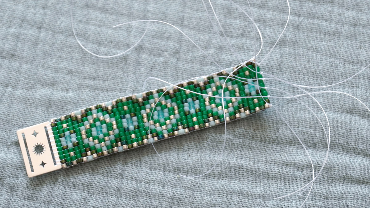Green miyuki beads bracelet on loom with spacer : Step 4 Green miyuki beads bracelet on loom with spacer : Step 4