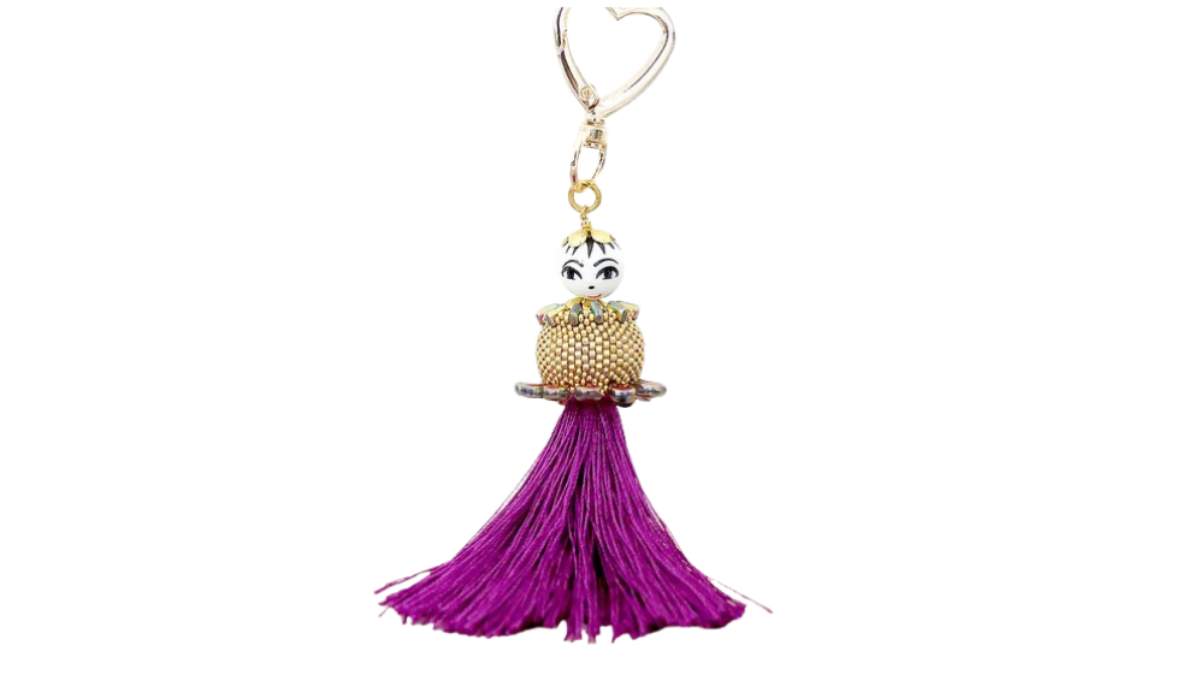 Miss Coco keychain by Puca with Amos glass beads, Piros and Jeff wood stand