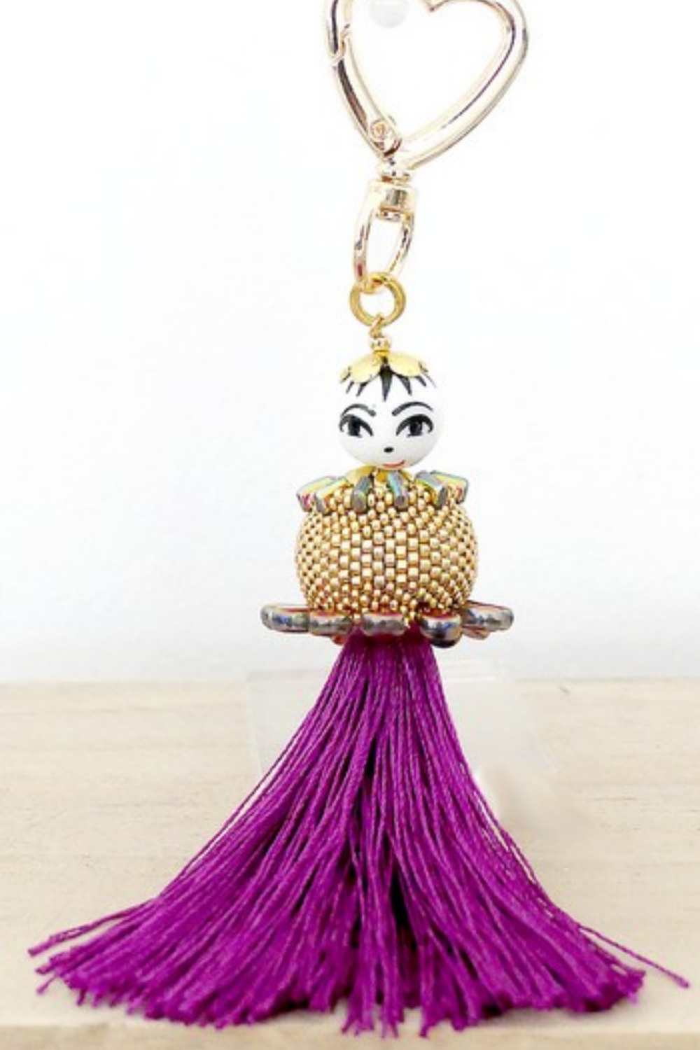 Schema Miss Coco keychain by Puca with Amos glass beads, Piros and Jeff wood stand Schema Miss Coco keychain by Puca with Amos glass beads, Piros and Jeff wood stand