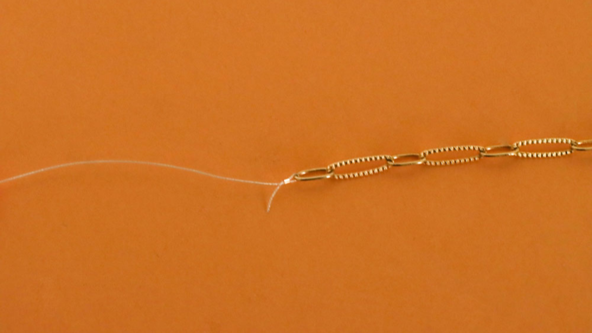 Multi-strand necklace with large shawl, Heihi beads, freshwater pearls and Libra zodiac charm. : Step 2