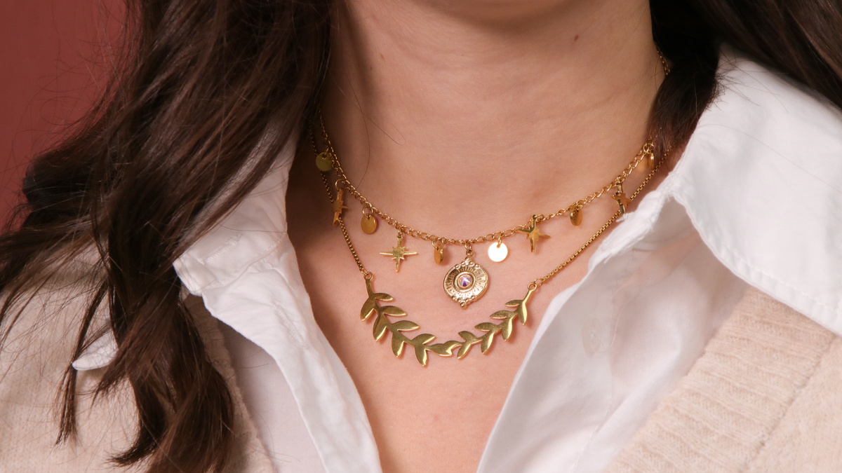 Two stainless steel necklaces gilded pendant branch