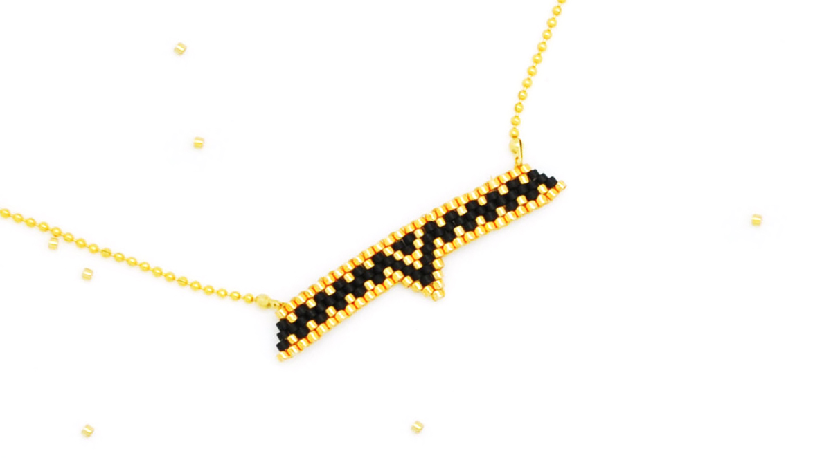 Weaving grid Miyuki necklace in black and gold Brick Stitch