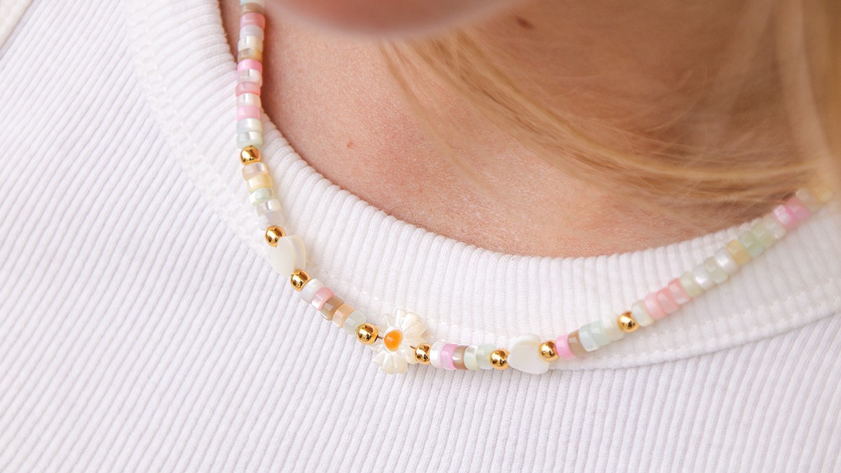 Summer necklace with heishi beads, heart and mother-of-pearl flowers Summer necklace with heishi beads, heart and mother-of-pearl flowers