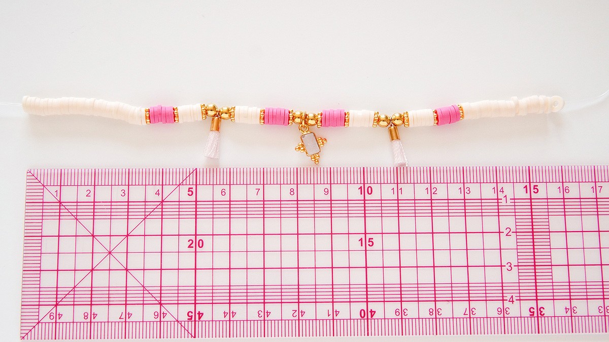 Assortment of bracelets with heishi and gold charms : Step 5
