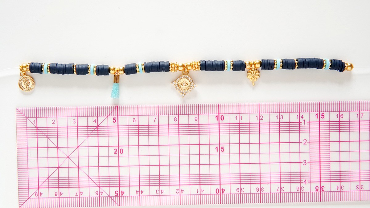 Assortment of bracelets with heishi and gold charms : Step 6